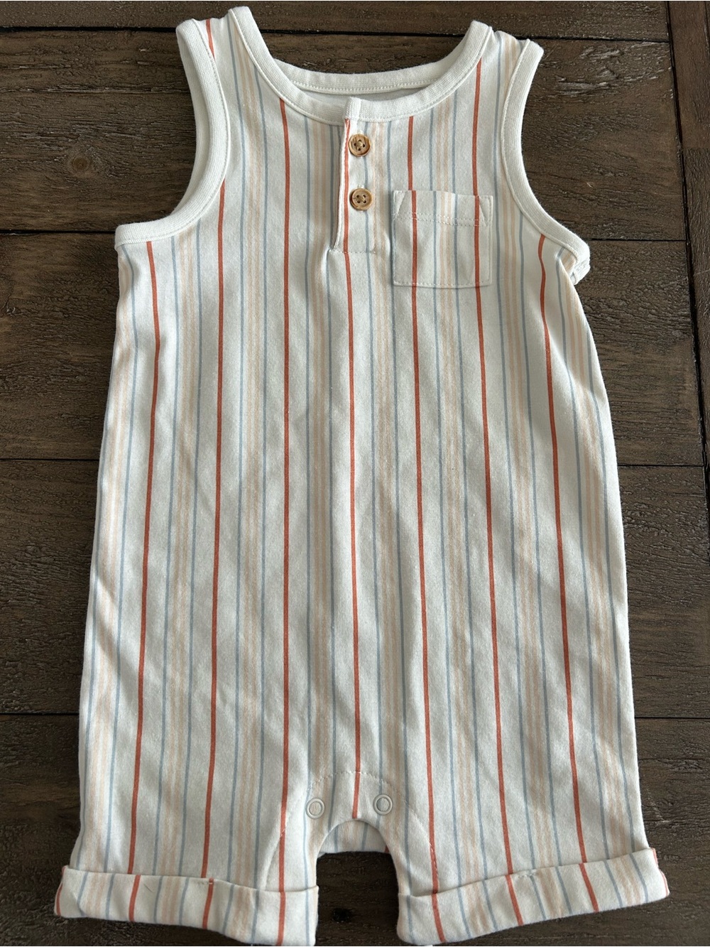 Striped Ivory Toddler Romper with Burnt Orange and Blue Stripes. Never worn